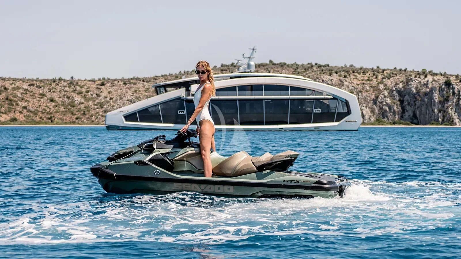 a person on a speed boat aboard THIS IS IT I Yacht for Sale