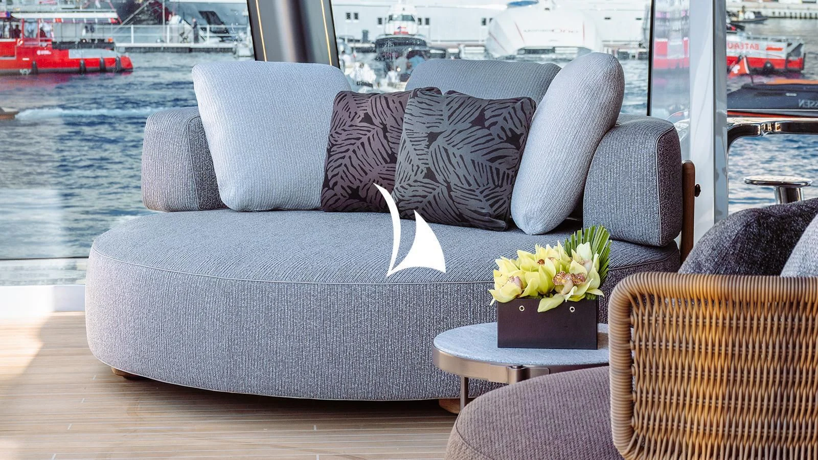 a couch with pillows and flowers aboard THIS IS IT I Yacht for Sale