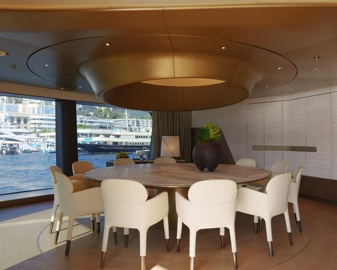 a table with chairs around it aboard THIS IS IT I Yacht for Sale