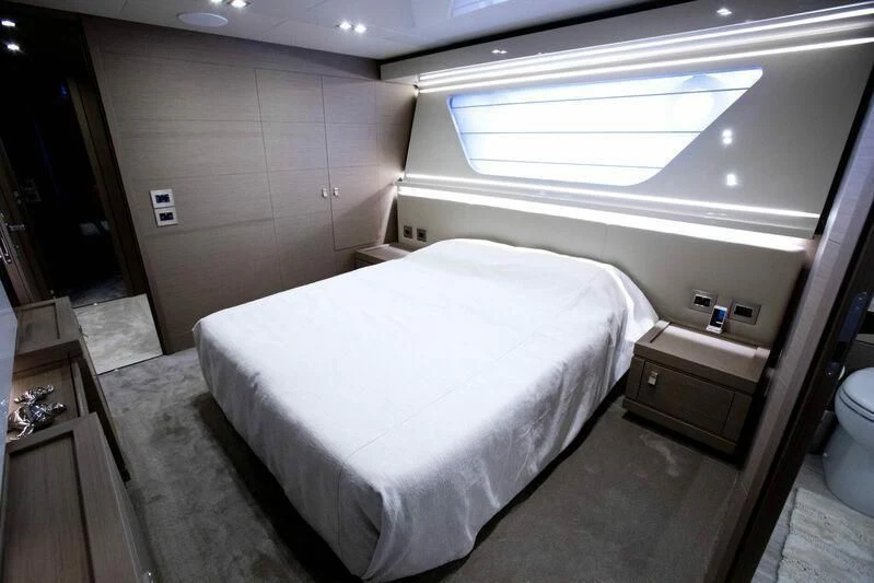a room with a bed and a window aboard CHELONIA Yacht for Sale