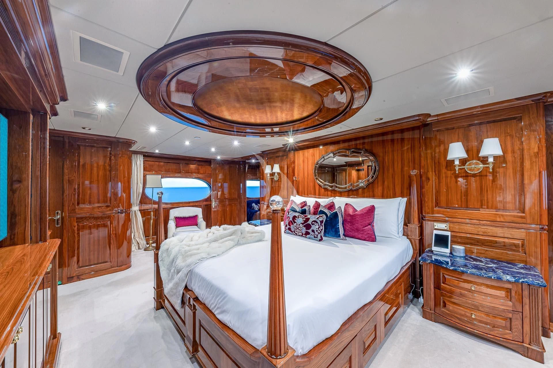 a bedroom with a large bed aboard AMORE Yacht for Charter