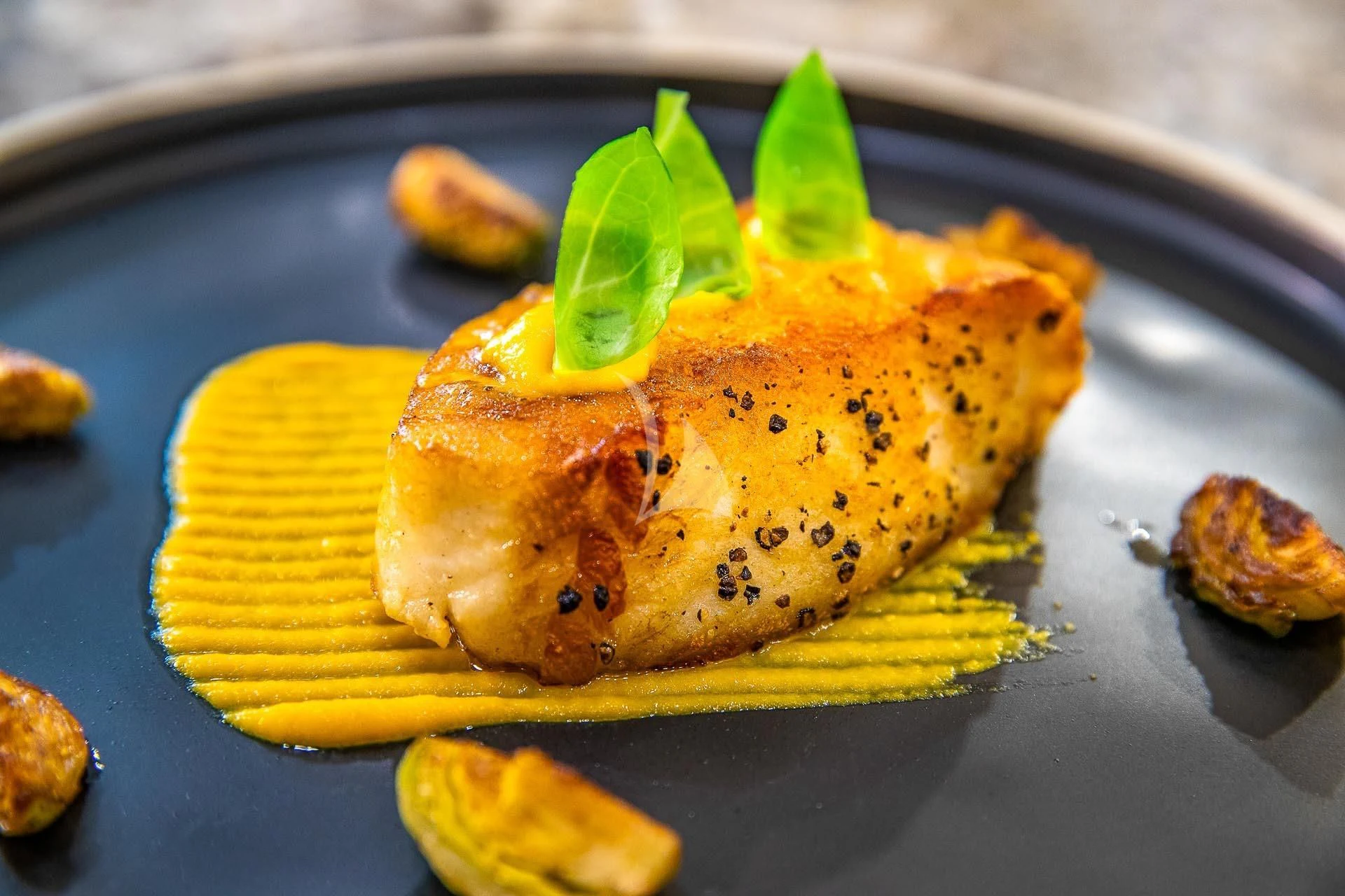 a plate of food aboard AMORE Yacht for Charter