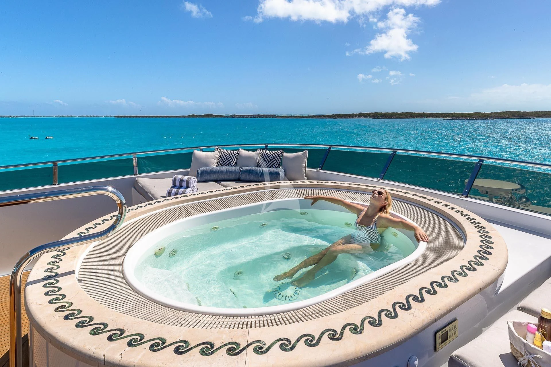a pool with a large pool aboard AMORE Yacht for Charter