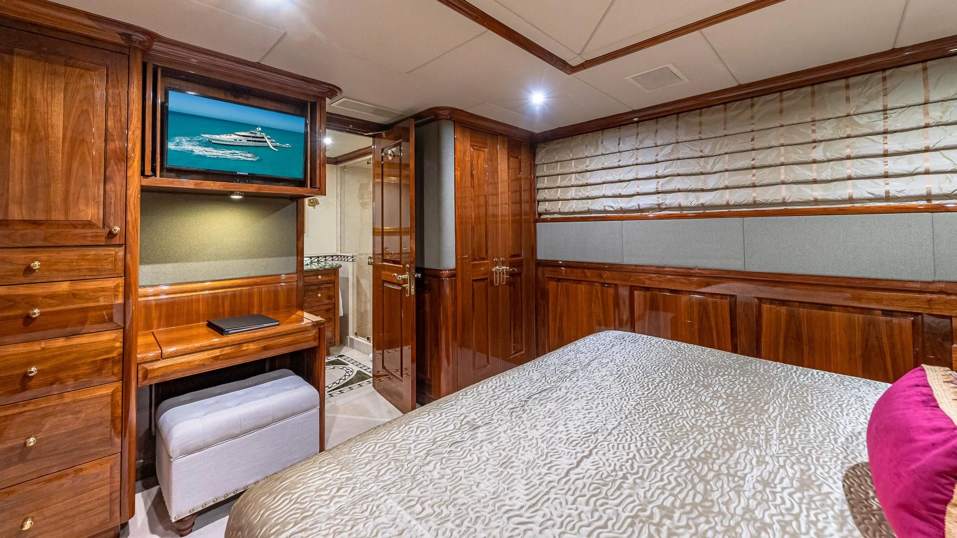 a bed in a room aboard AMORE Yacht for Charter