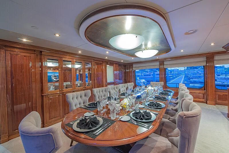 a dining room with a table aboard AMORE Yacht for Charter