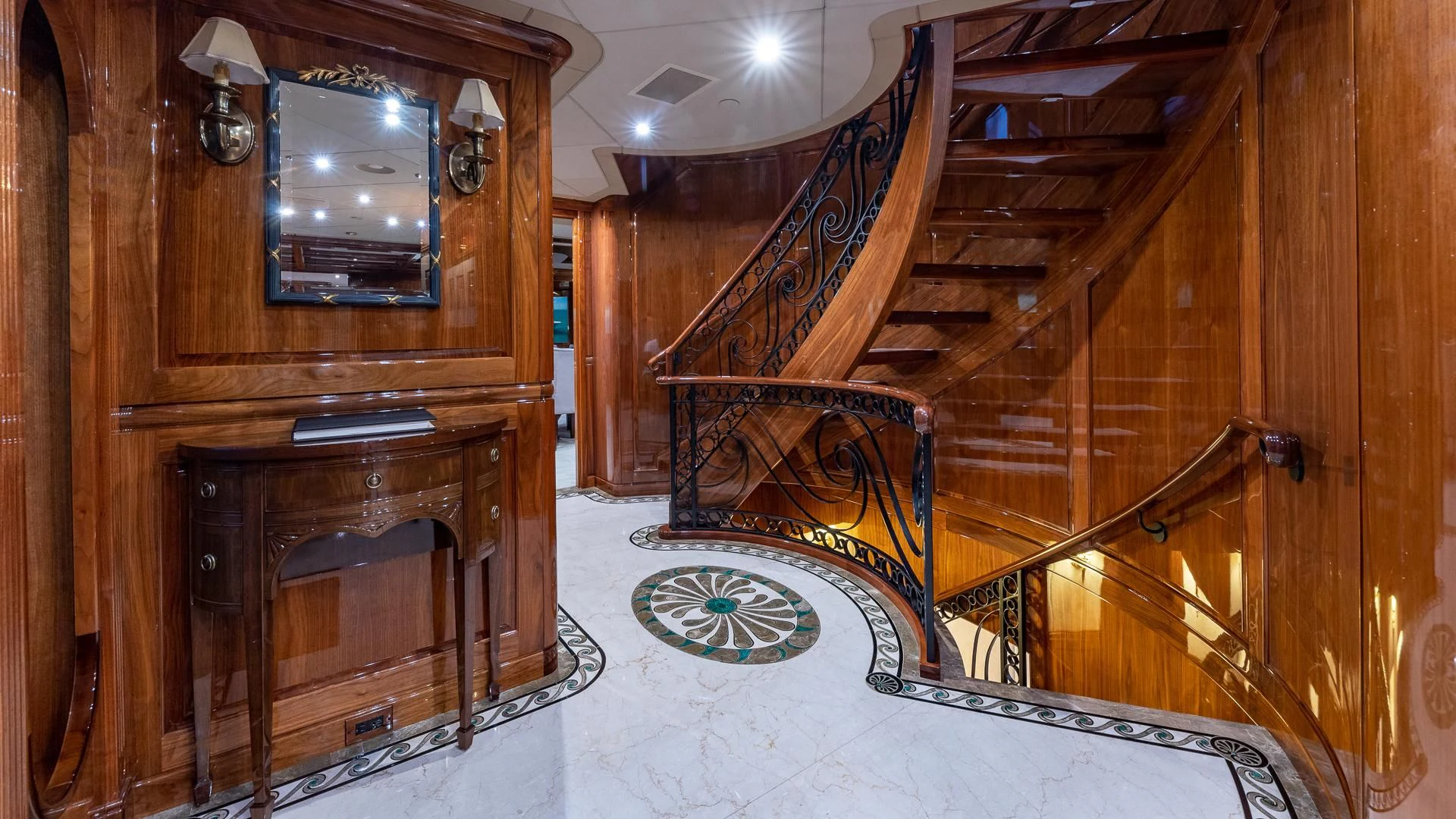 a wooden staircase in a room aboard AMORE Yacht for Charter