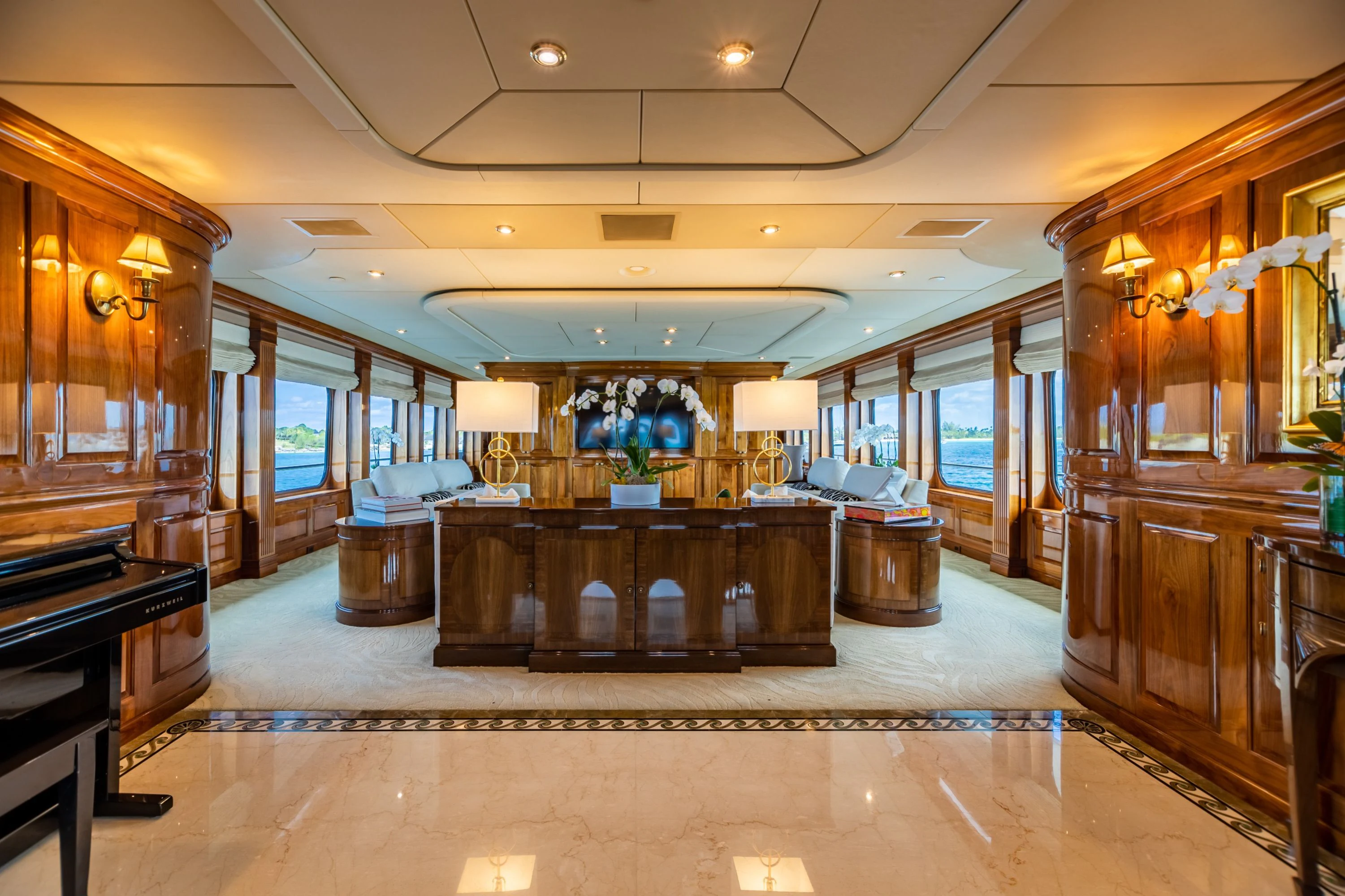 a large room with a large mirror aboard AMORE Yacht for Charter
