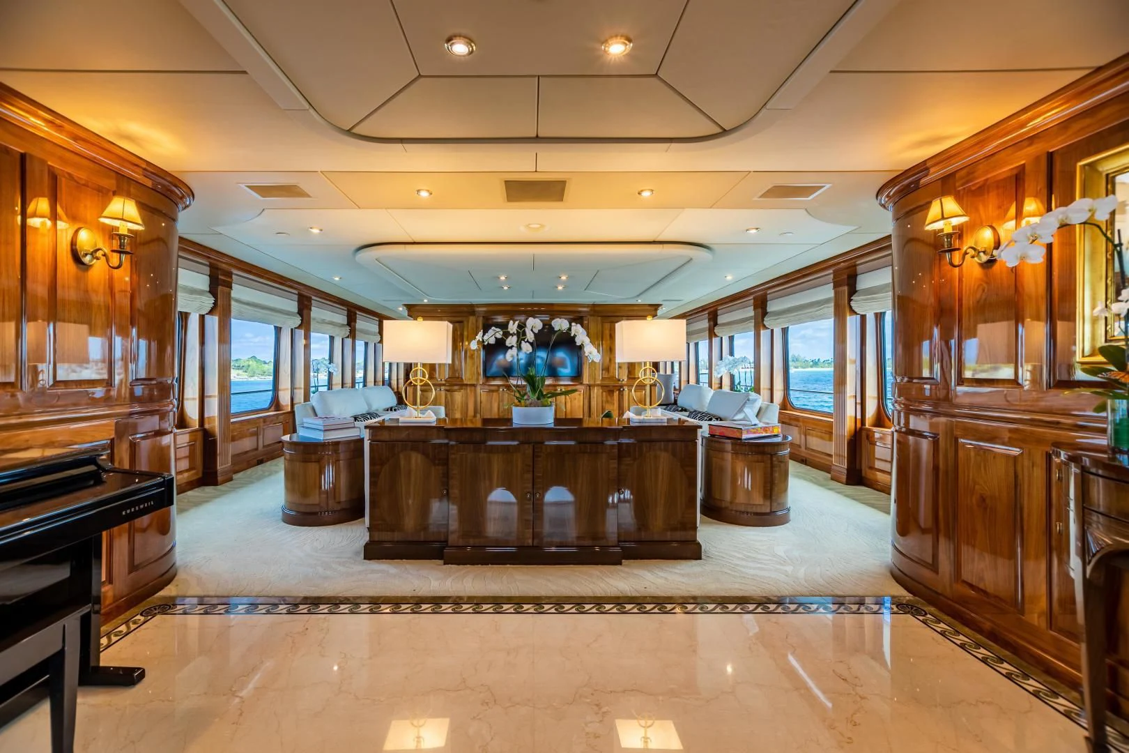 a large room with a large mirror aboard AMORE Yacht for Charter