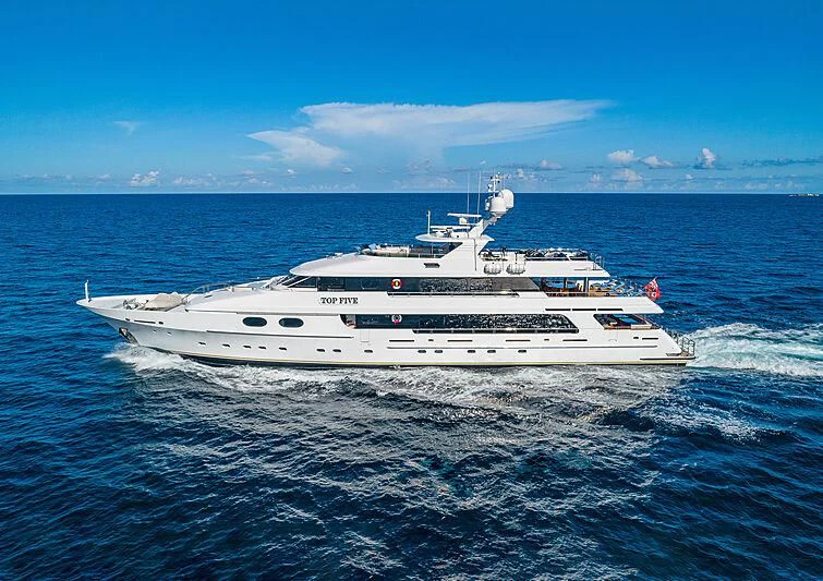 a white boat in the water aboard AMORE Yacht for Charter