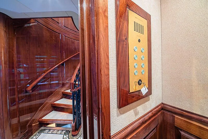 a clock on a wall aboard AMORE Yacht for Charter