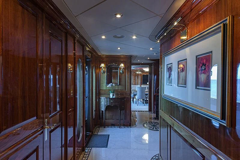 a room with wooden cabinets aboard AMORE Yacht for Charter