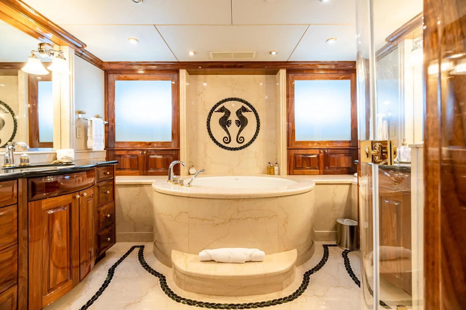 a bathroom with a bathtub aboard AMORE Yacht for Charter