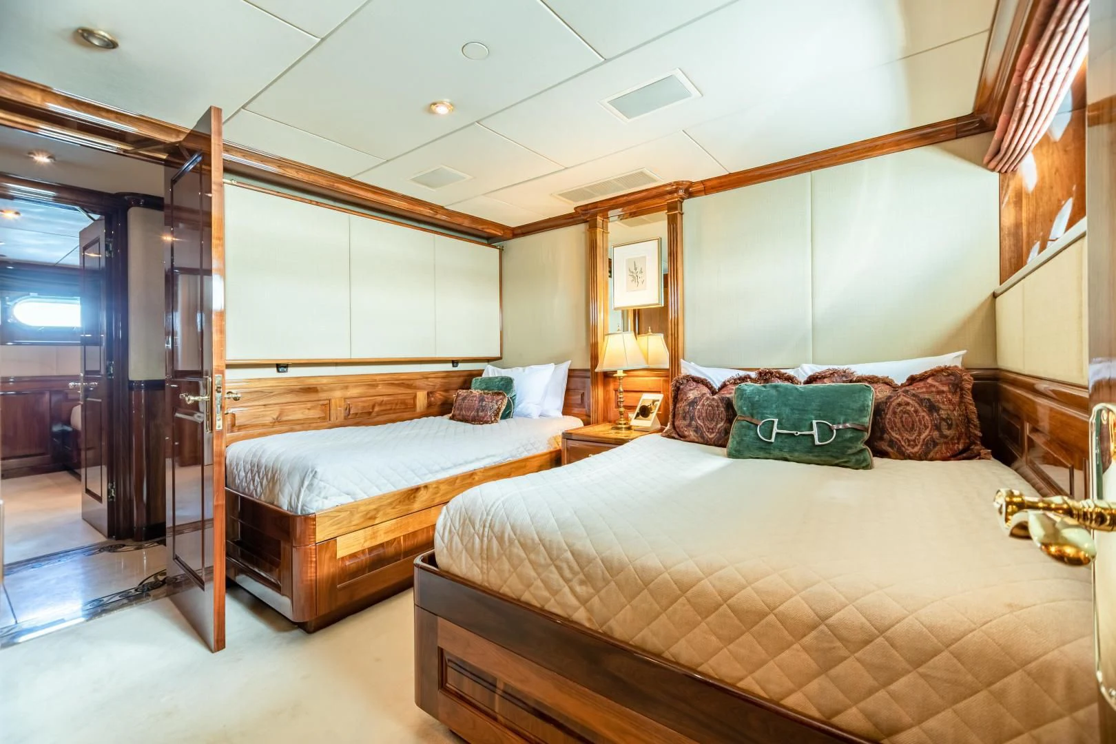 a hotel room with two beds aboard AMORE Yacht for Charter