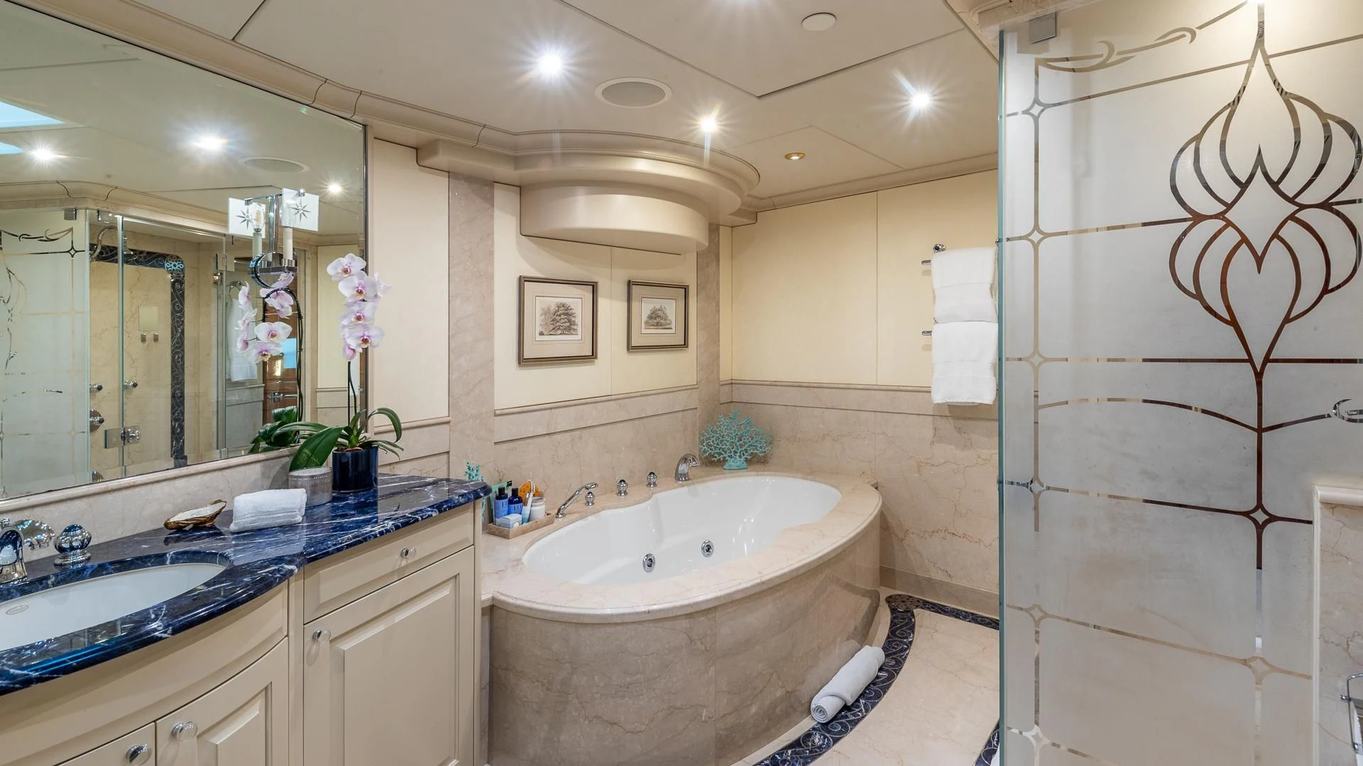 a bathroom with a large bathtub aboard AMORE Yacht for Charter