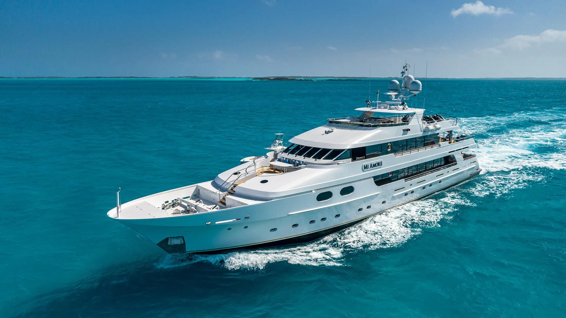 a white yacht in the ocean aboard AMORE Yacht for Charter