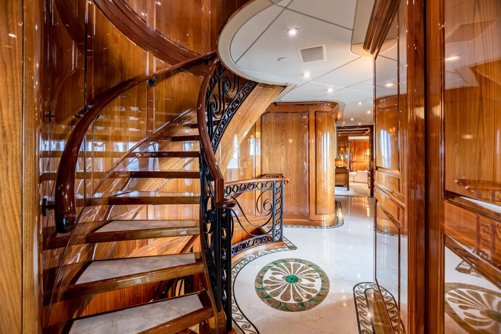 a staircase in a building aboard AMORE Yacht for Charter