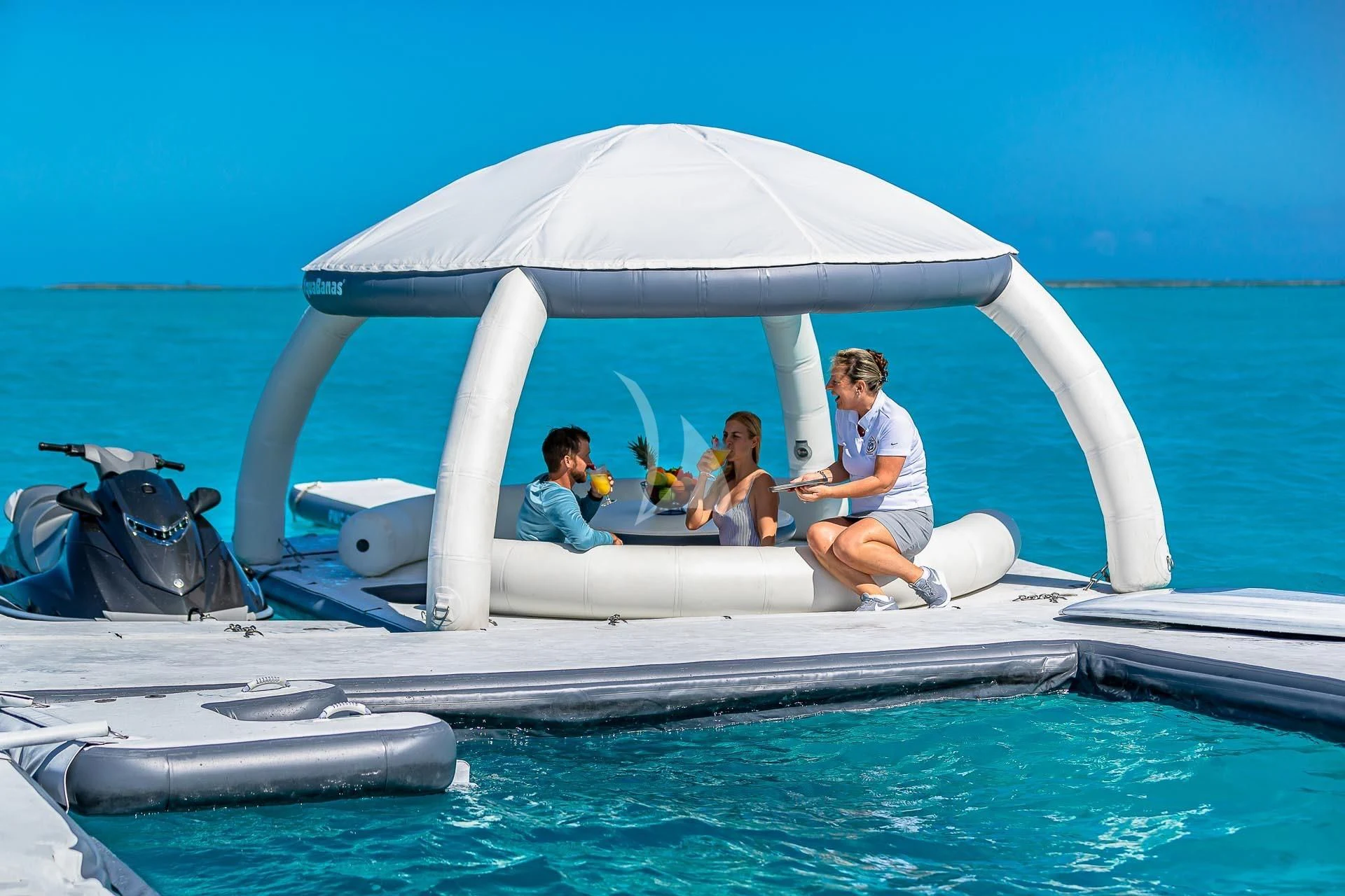 a group of people on a boat aboard AMORE Yacht for Charter