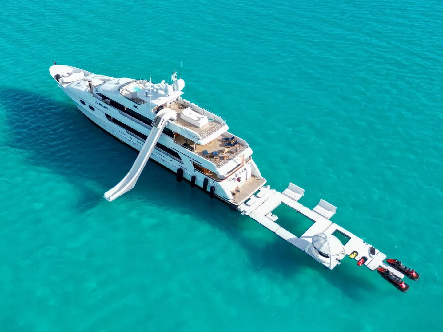 a large white ship in the water aboard AMORE Yacht for Charter