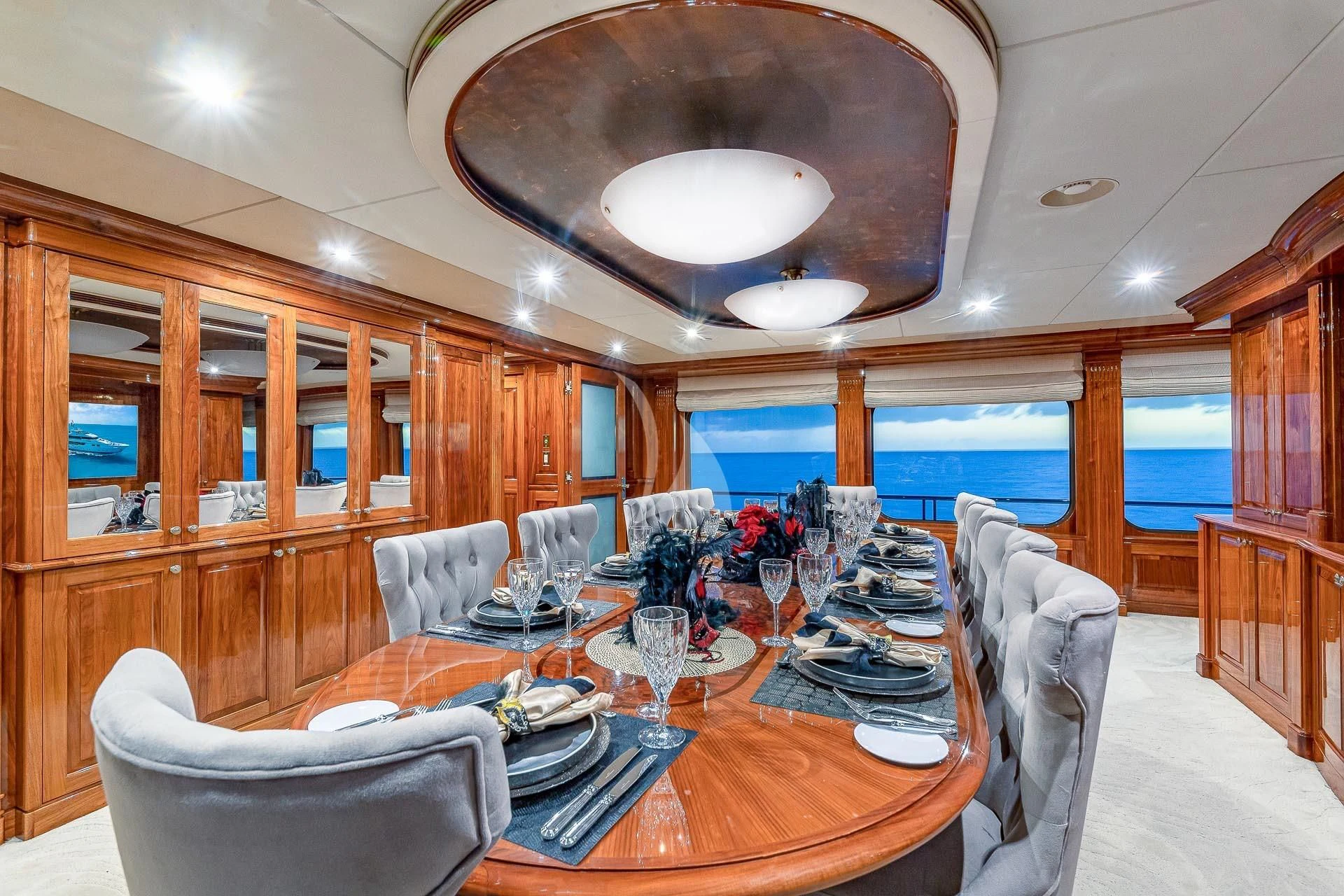 a dining table in a kitchen aboard AMORE Yacht for Charter
