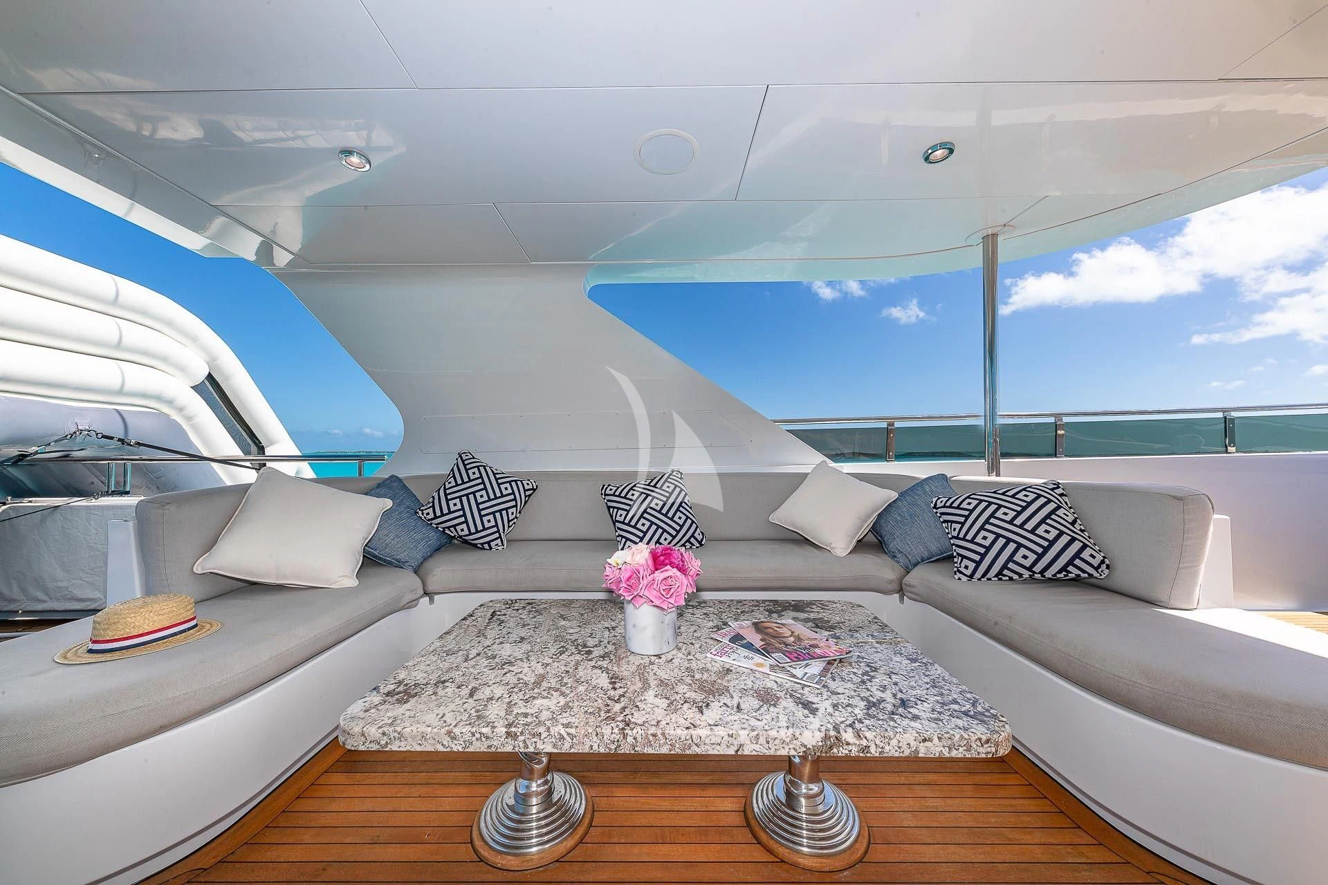 a room with a bed and a table aboard AMORE Yacht for Charter