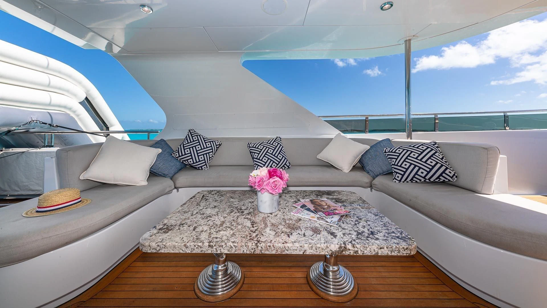 a room with a bed and a table aboard AMORE Yacht for Charter