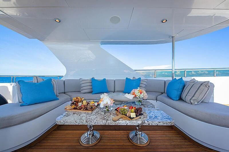 a living room with a large window aboard AMORE Yacht for Charter