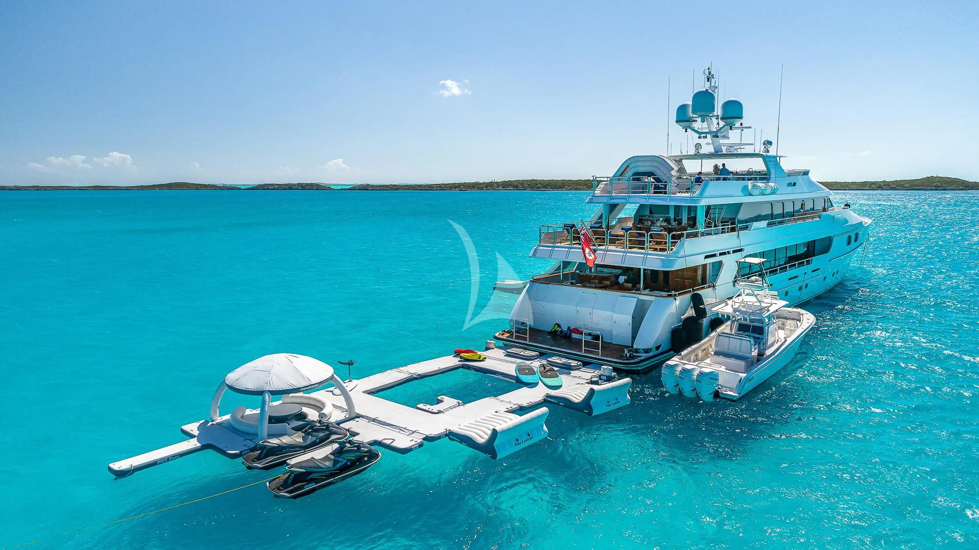 a boat and a helicopter on the water aboard AMORE Yacht for Charter