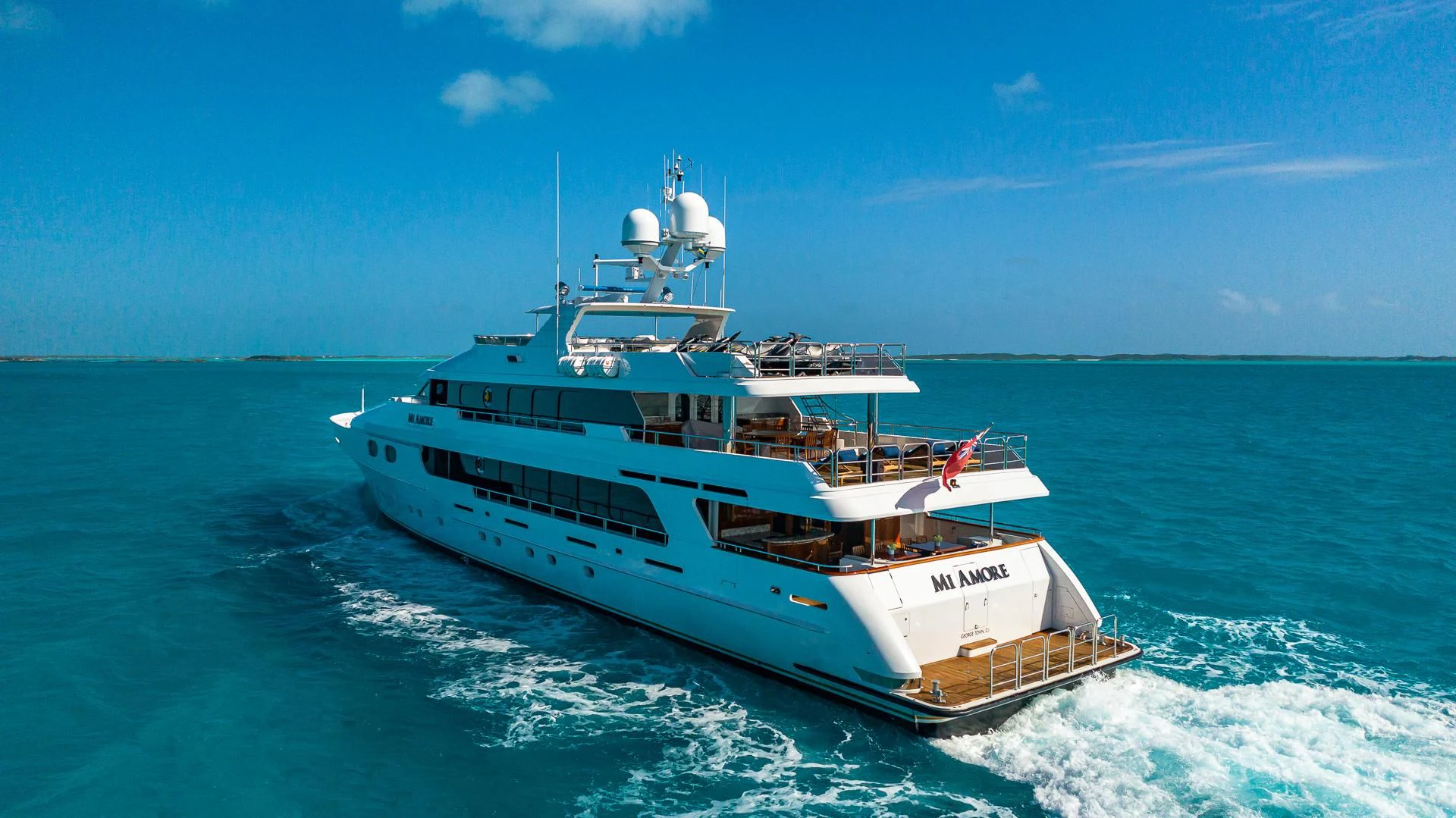 a white yacht on the water aboard AMORE Yacht for Charter