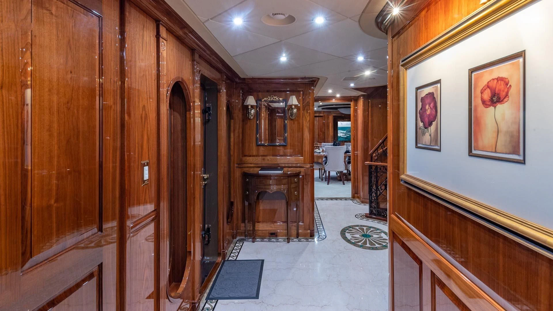 a room with wooden cabinets aboard AMORE Yacht for Charter