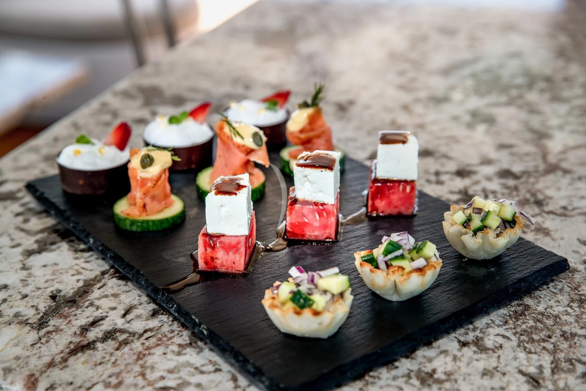 a group of small plastic figures aboard AMORE Yacht for Charter