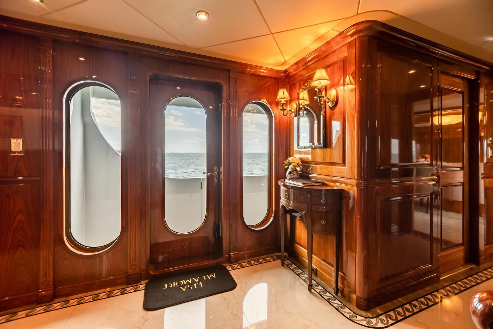 a bathroom with a large mirror aboard AMORE Yacht for Charter