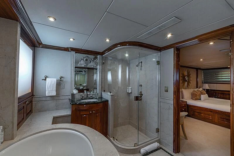 a bathroom with a glass shower aboard AMORE Yacht for Charter
