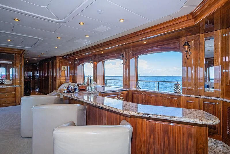 a large kitchen with a large island aboard AMORE Yacht for Charter