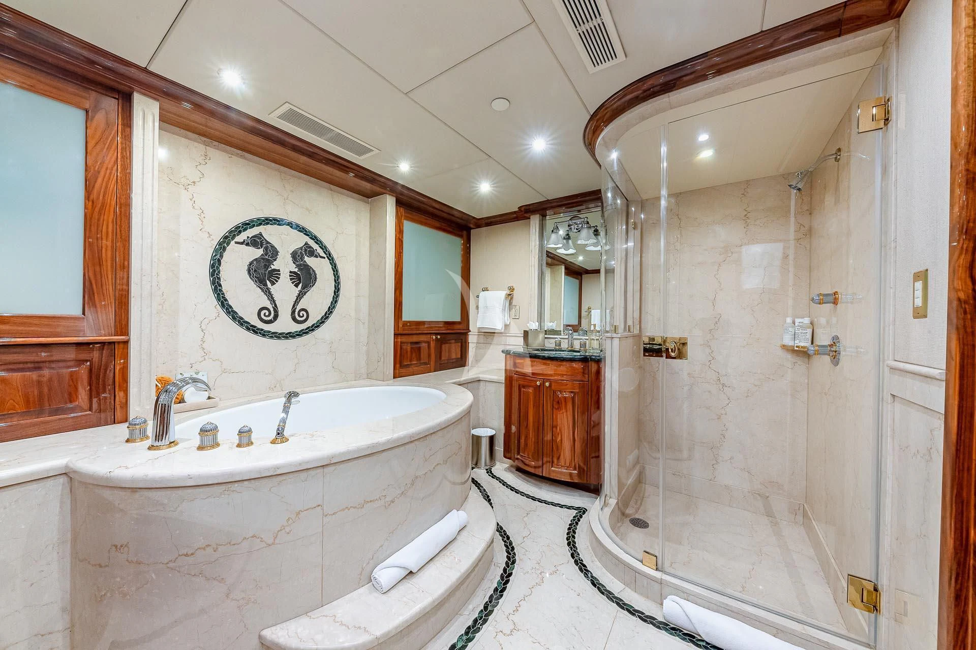 a large bathroom with a tub aboard AMORE Yacht for Charter