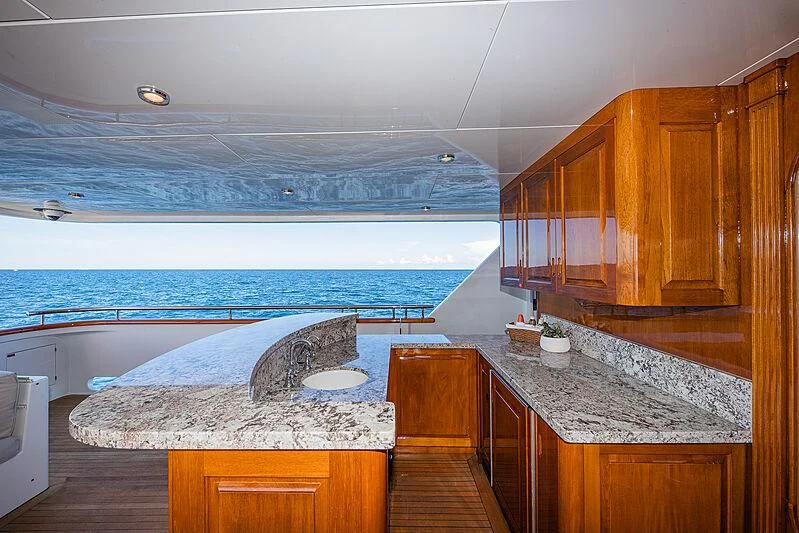 a large kitchen with a large pool aboard AMORE Yacht for Charter