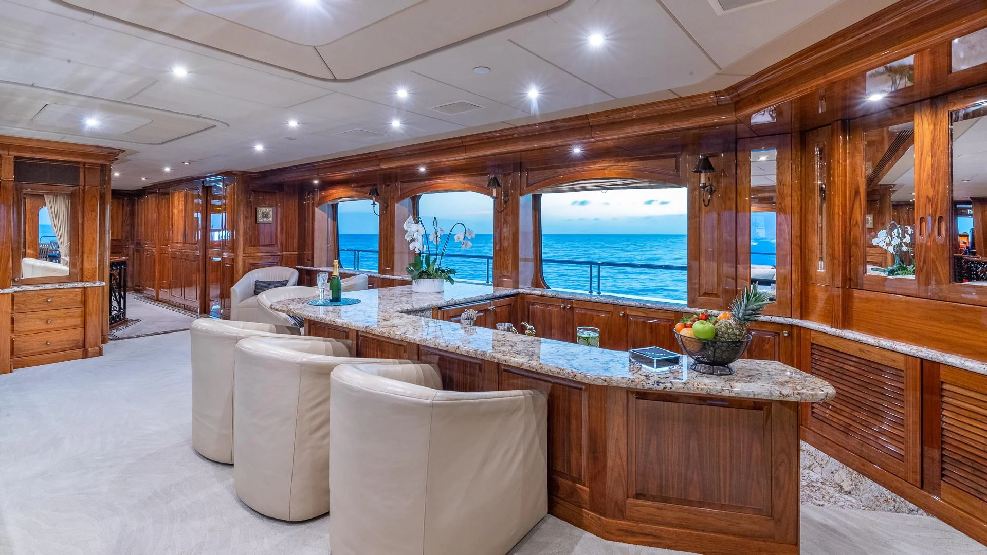a large kitchen with a large island aboard AMORE Yacht for Charter