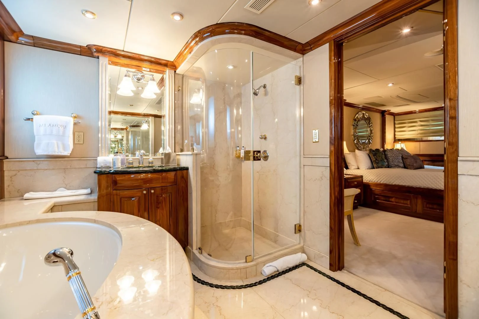 a bathroom with a glass shower aboard AMORE Yacht for Charter