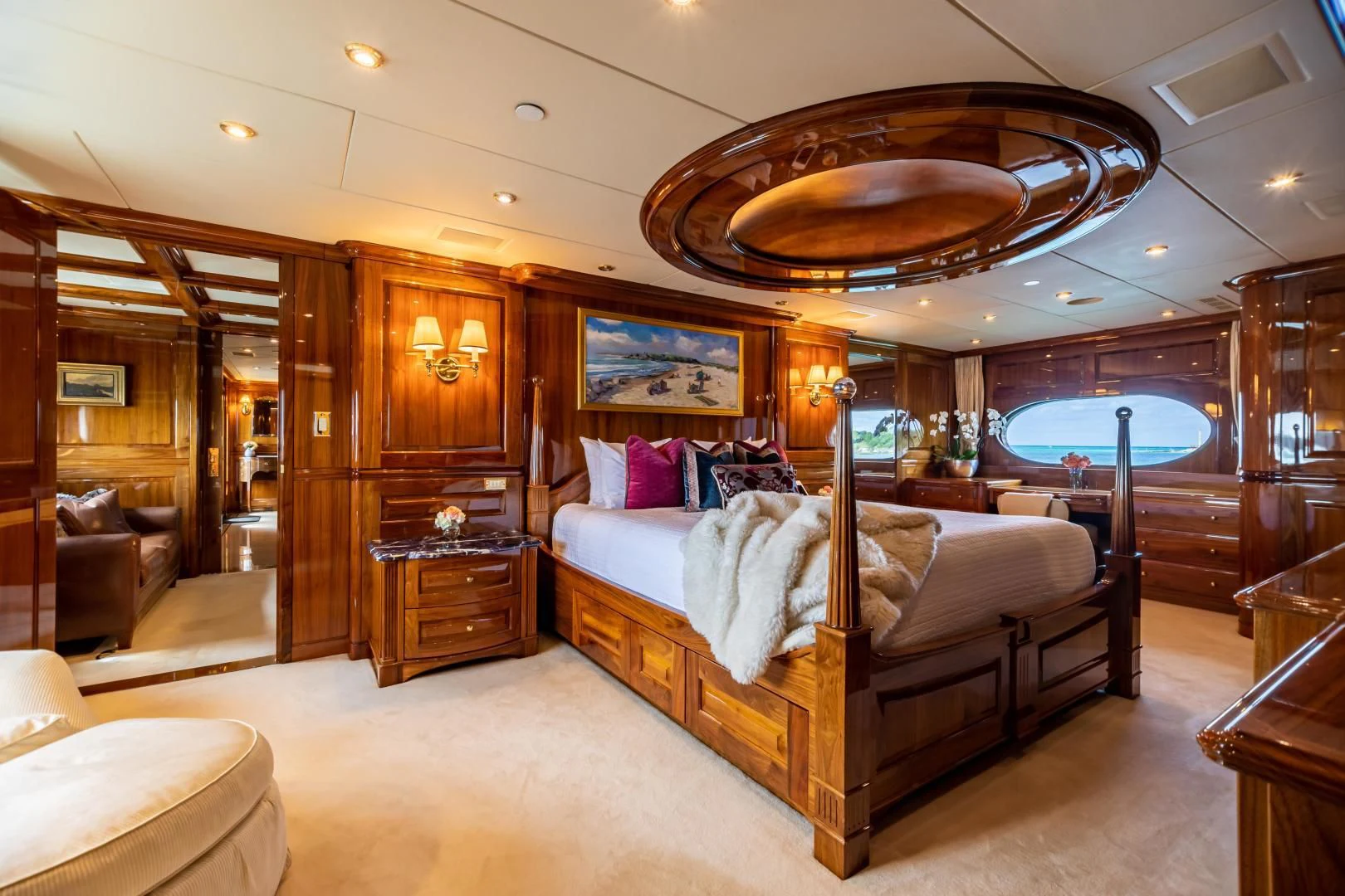 a large bedroom with a large bed aboard AMORE Yacht for Charter