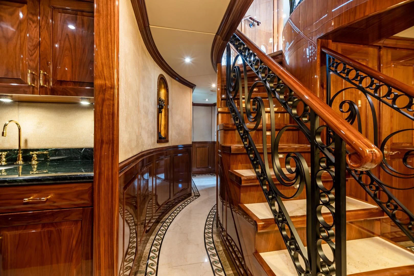 a staircase in a building aboard AMORE Yacht for Charter