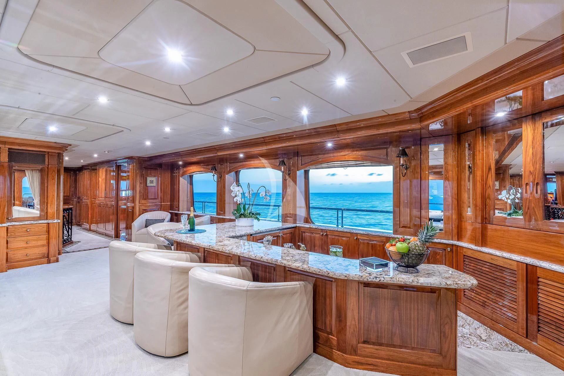 a large kitchen with a large island aboard AMORE Yacht for Charter