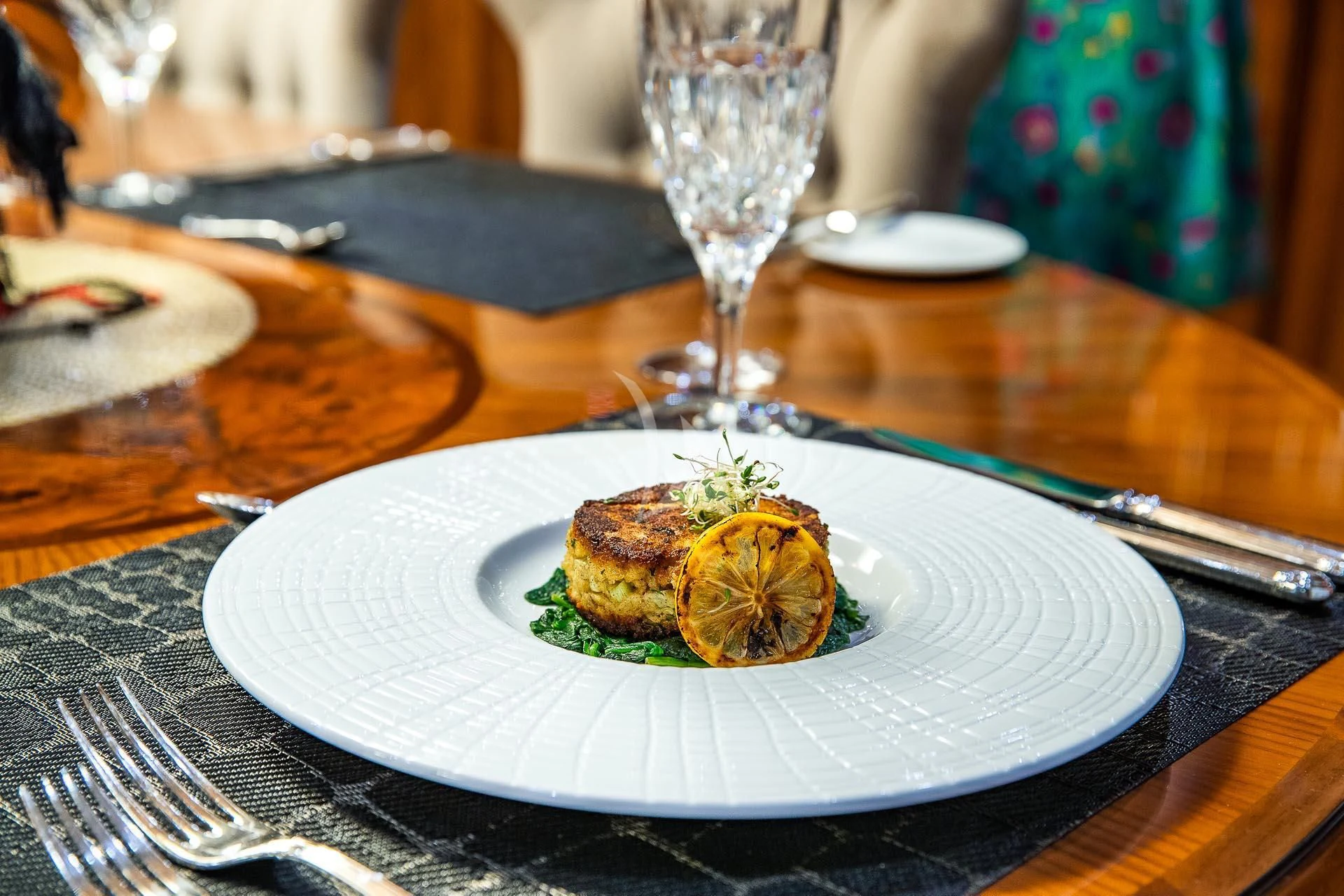 a plate of food aboard AMORE Yacht for Charter