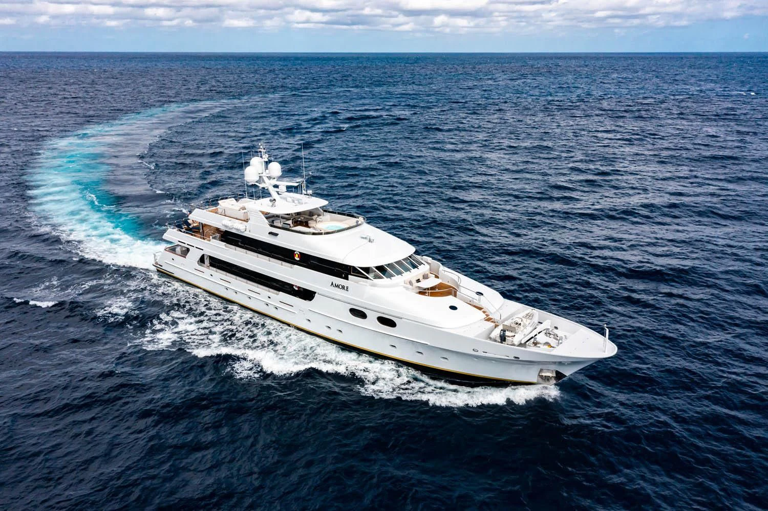 a white yacht in the water aboard AMORE Yacht for Charter