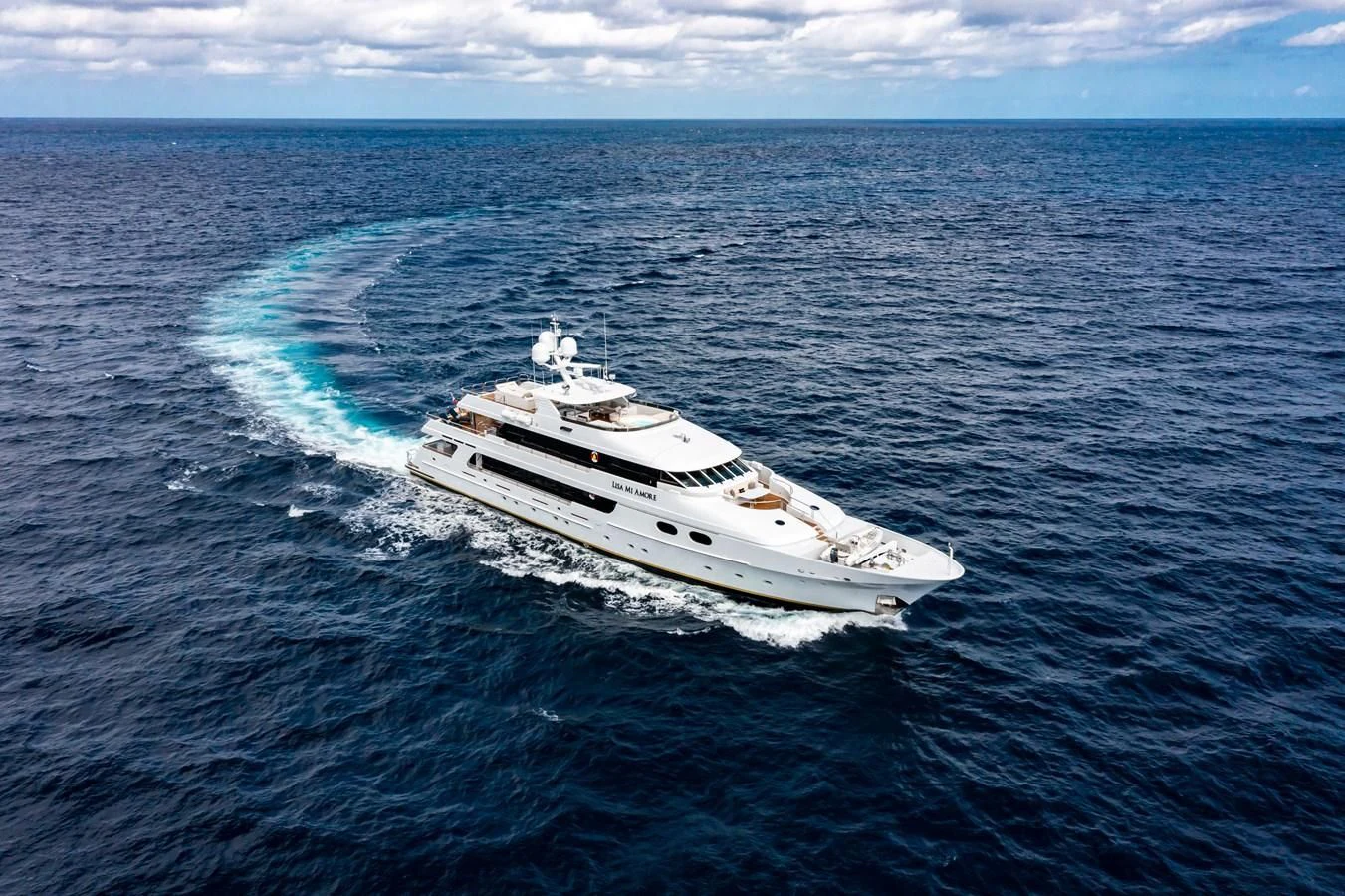 a white yacht in the water aboard AMORE Yacht for Charter