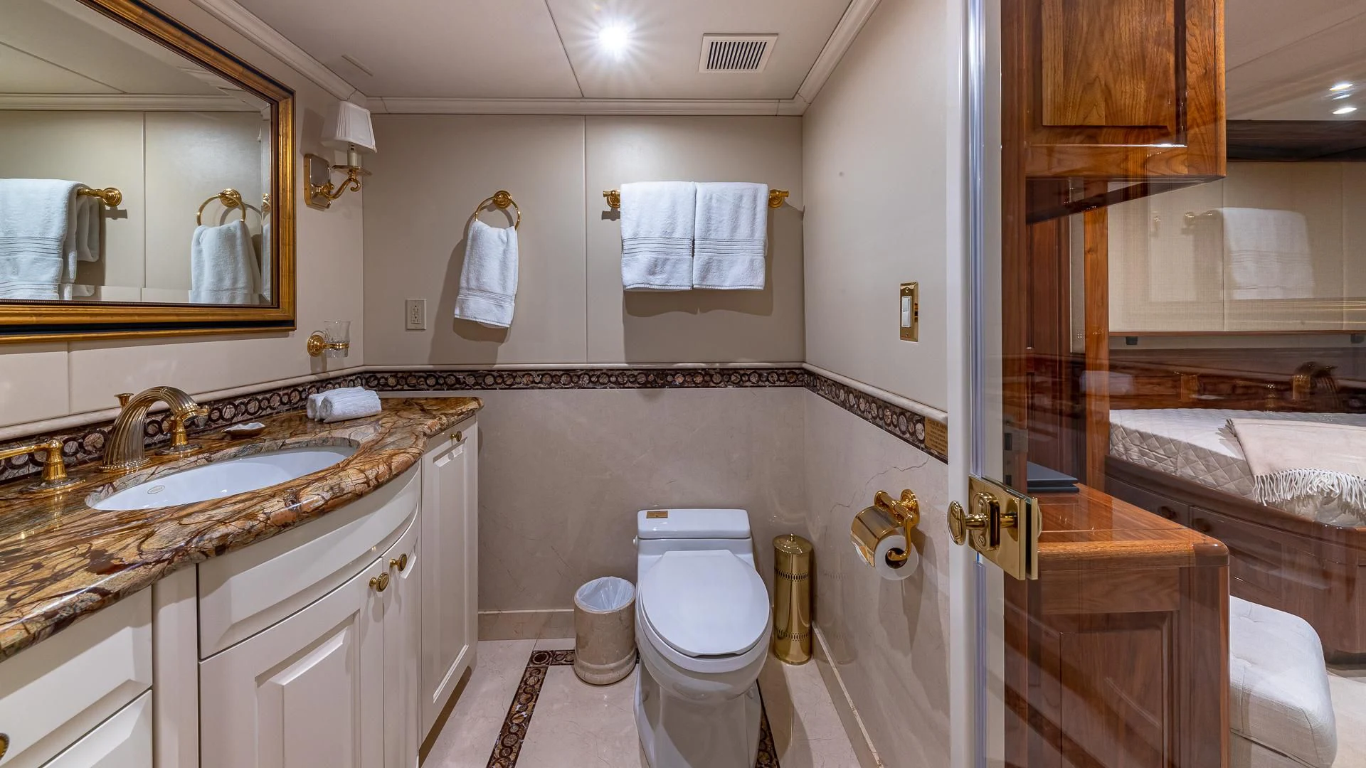 a bathroom with a sink toilet and a bathtub aboard AMORE Yacht for Charter