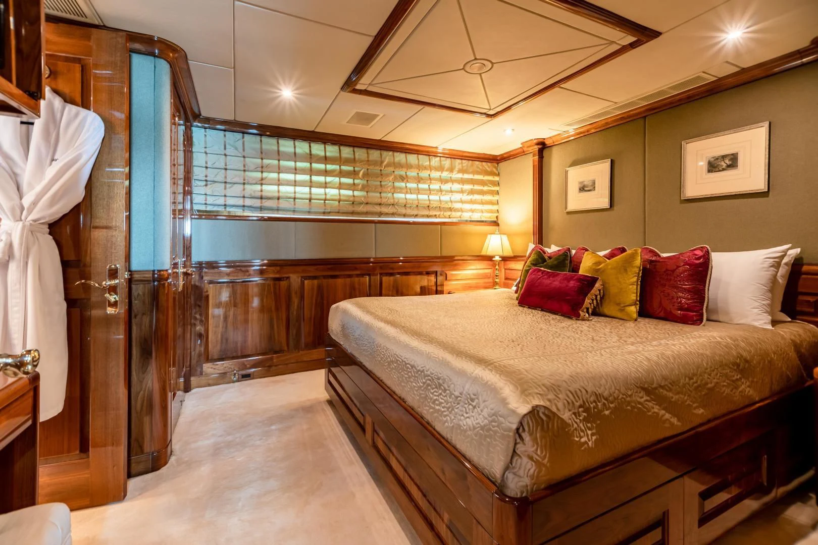 a large bed in a room aboard AMORE Yacht for Charter