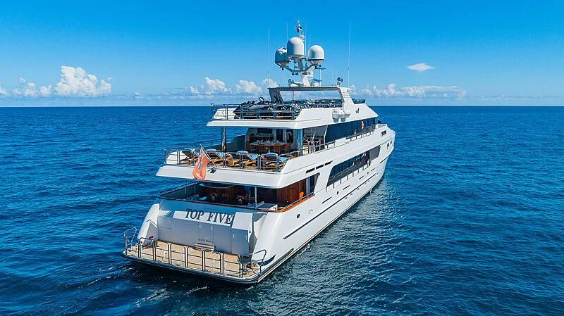 a large white boat in the water aboard AMORE Yacht for Charter