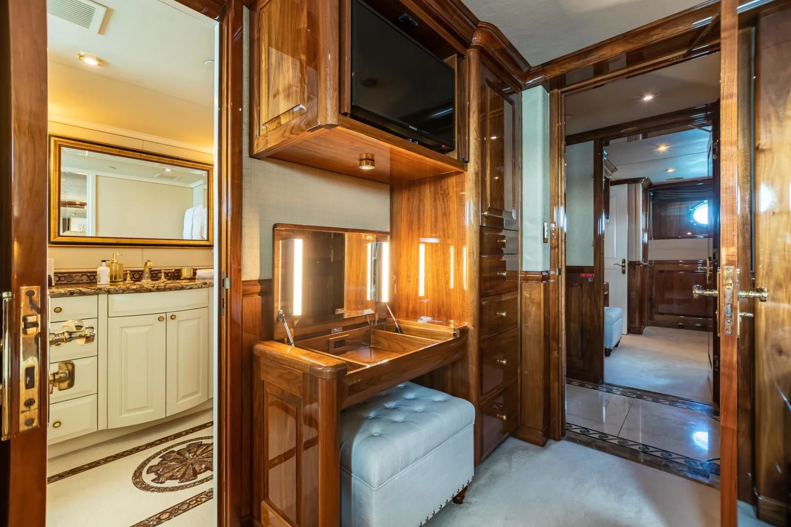 a bathroom with a sink and cabinets aboard AMORE Yacht for Charter