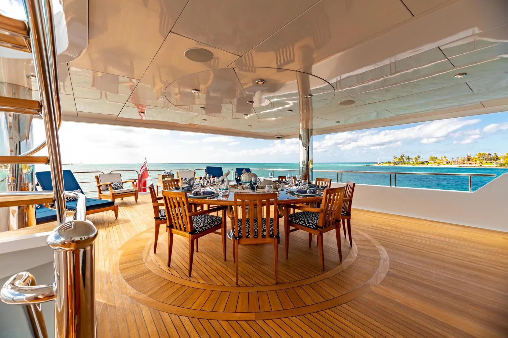 a room with a table and chairs aboard AMORE Yacht for Charter