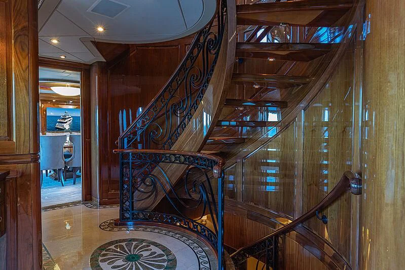 a staircase in a building aboard AMORE Yacht for Charter