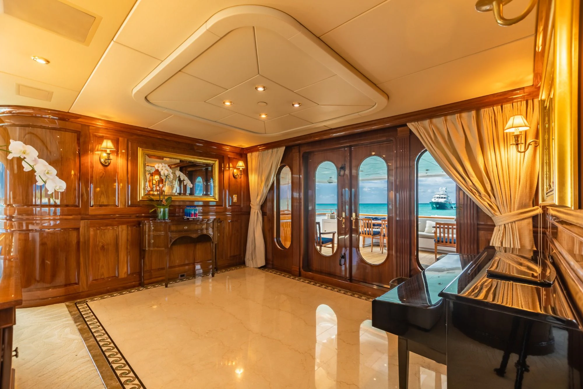 a large room with a large mirror and a large window aboard AMORE Yacht for Charter